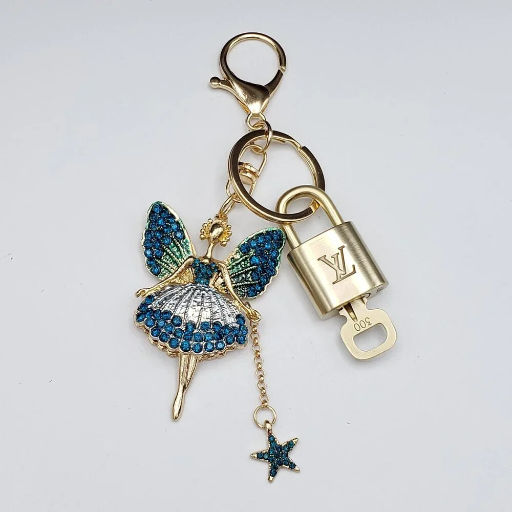 Authentic Louis Vuitton Lock & Key with Unbranded Fairy Charm, Keychain